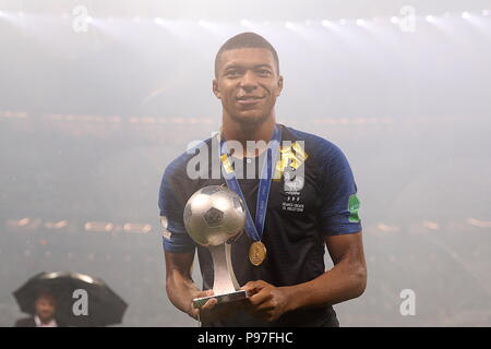 Moscow, Russia. 15th July, 2018. MOSCOW, RUSSIA - JULY 15, 2018: France's Kylian Mbappe holds the FIFA Young Player award at a victory ceremony after winning their 2018 FIFA World Cup final football match against Croatia at Luzhniki Stadium. Team France won the game 4:2 and claimed the World Cup title. Sergei Bobylev/TASS Credit: ITAR-TASS News Agency/Alamy Live News