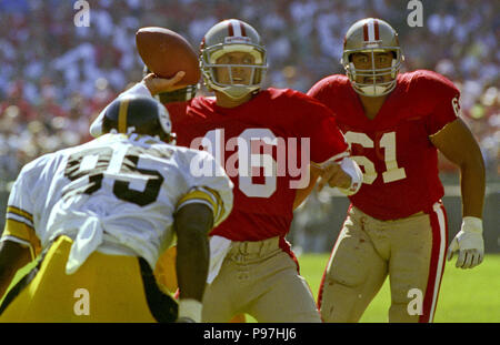 San Francisco, California, USA. 21st Oct, 1990. San Francisco 49ers vs  Pittsburg Steelers at Candlestick Park Sunday, October 21, 1990. 49ers beat  Steelers 27-7. 49er quarterback Joe Montana (16) passes over Steelers