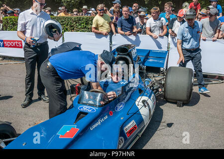 Goodwood Festival of Speed, West Sussex, UK. 15th July 2018. Celebrating 25 years, Silver Jubilee. Jackie Stewart former British Formula One racing legend, preparing to race.. © Gillian Downes/AlamyLive News