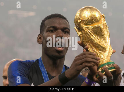 France's Paul Pogba celebrates with the trophy after winning the FIFA World Cup Final at the Luzhniki Stadium, Moscow. Stock Photo