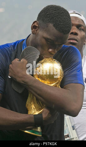 France's Paul Pogba celebrates with the trophy after winning the FIFA World Cup Final at the Luzhniki Stadium, Moscow. Stock Photo