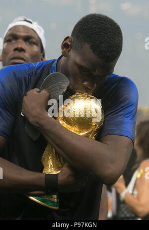 France's Paul Pogba celebrates with the trophy after winning the FIFA World Cup Final at the Luzhniki Stadium, Moscow. Stock Photo