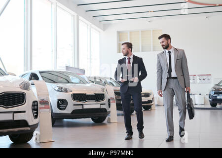 Man choosing a new car Stock Photo
