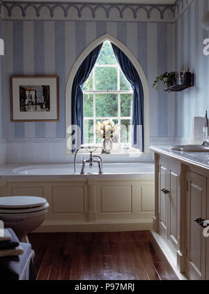 Bathroom with Striped Wallpaper and Border Stock Photo