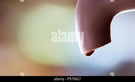 old faucet dripping water, no wastage of water concept Stock Photo