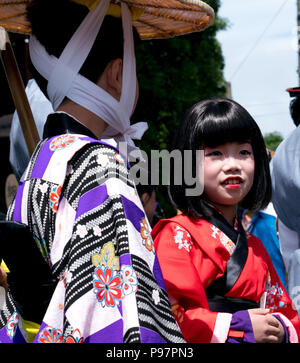 In Japan, where rice is regarded as gift from gods, planting is celebrated as a holy event. Isobe no Omita festival is held annually near Ise Shrine. Stock Photo