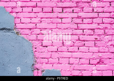 Exposed brick on damaged wall, abstract background from concrete and painted pink brick wall texture urban background, copy space