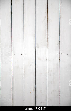 White wooden planks, picket fence style background. Image works well as vertical or horizontal image. Stock Photo