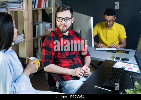 Creative Young People Working in Office Stock Photo