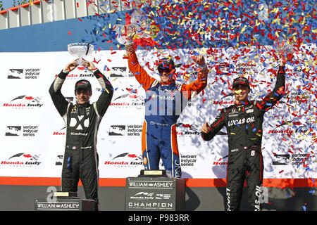 Toronto, Ontario, Canada. 15th July, 2018. SCOTT DIXON (9) of New Zealand, SIMON PAGENAUD (22) of France, and ROBERT WICKENS (6) of Canada celebrate after finishing on the podium for the Honda Indy Toronto at Streets of Toronto in Toronto, Ontario. Credit: Justin R. Noe Asp Inc/ASP/ZUMA Wire/Alamy Live News Stock Photo