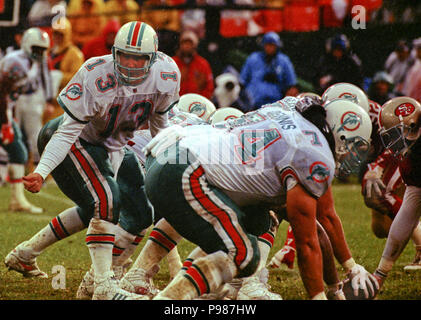 San Francisco 49ers vs. Miami Dolphins. Fans support on NFL Game.  Silhouette of supporters, big screen with two rivals in background Stock  Photo - Alamy