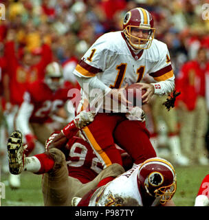 9 Jan 1993: Quarterback Mark Rypien of the Washington Redskins drops back  to pass during the Redskins 20-13 loss to the San Francisco 49ers in an NFC  second round playoff game at