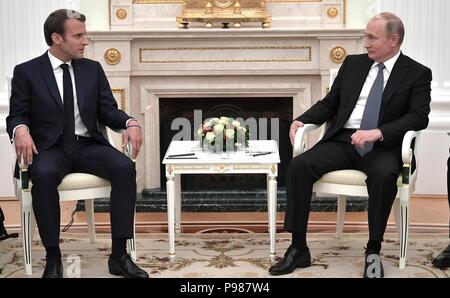 Moscow, Russia. 15th July 2018. Russian President Vladimir Putin, right, during a bilateral meeting with French President Emmanuel Macron at the Kremlin July 15, 2018 in Moscow, Russia. Macron was in Moscow to attend the final match in the Soccer World Cup which France won 4-2 over Croatia. Credit: Planetpix/Alamy Live News Stock Photo