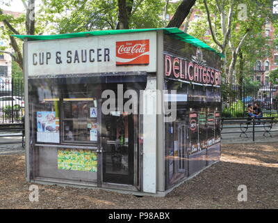 New York, USA. 13th July, 2018. The mock corner shop 'Mom-and-Pops of the L.E.S' by the photographers James and Karla Murray standing in Seward Park. Credit: Johannes Schmitt-Tegge/dpa/Alamy Live News Stock Photo