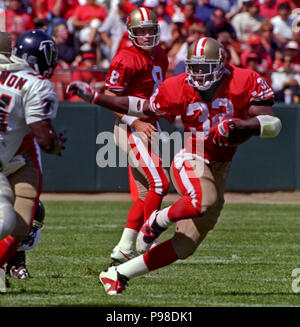 San Francisco, California, USA. 22nd Nov, 1993. San Francisco 49ers vs. New  Orleans Saints at Candlestick Park Monday, November 22, 1993. 49ers beat  Saints 42-7. San Francisco 49ers running back Ricky Watters (