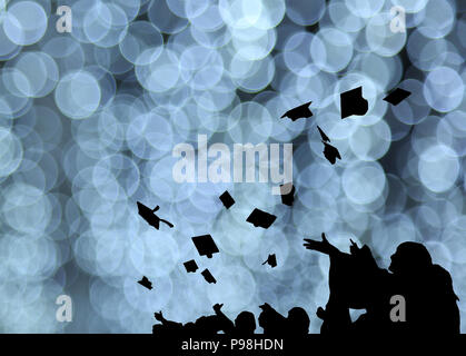 Silhouette of Graduate Students throw mortarboards in university graduation success ceremony. Congratulation on Education Success, Graduation Ceremony Stock Photo