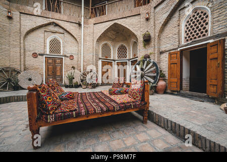 Courtyard of a medieval caravanserai in Bukhara, Uzbekistan. Central Asia Stock Photo