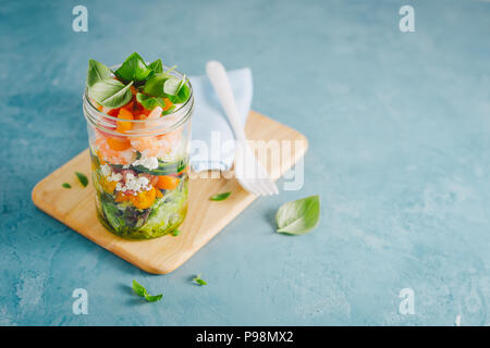 Tasty served salad wuth prawns in jar on table. Ready to eat. Detox Clean Eating Concept Stock Photo