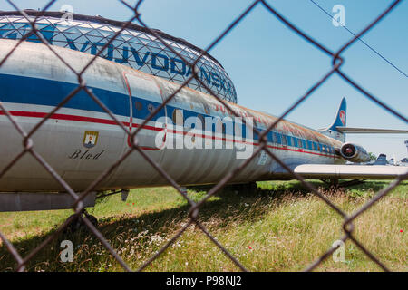 A neglected Sud-Aviation SE-210 Caravelle of JAT Airways, in front of the dome of Aeronautical Museum Belgrade, Serbia Stock Photo