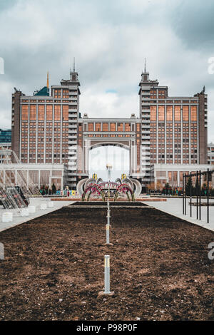 Headquarters head office of the KazMunaiGas in Astana Kazakhstan with Bayterek Tower in Background Stock Photo