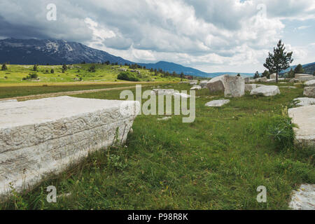 The white Dugo Polje necropolis with over 130 white stećak (tombstones) in Blidinje, Bosnia and Herzegovina Stock Photo
