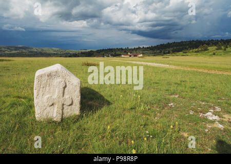 The white Dugo Polje necropolis with over 130 white stećak (tombstones) in Blidinje, Bosnia and Herzegovina Stock Photo