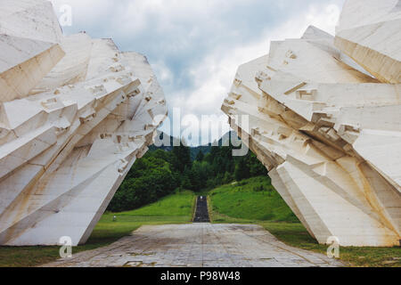 a gigantic, obscure white concrete spomenik (Yugoslav war memorial monument) sits in the Sutjeska National Park, Bosnia and Herzegovina Stock Photo