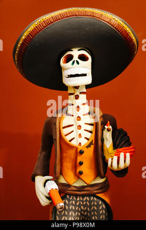 Merida, Yucatan, Mexico : Traditional  Majolica pottery depicting a male version of La Calavera Catrina at the small museum in the Hacienda San Pedro  Stock Photo