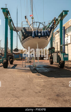 catamaran hang in the dock at a shipyard Stock Photo