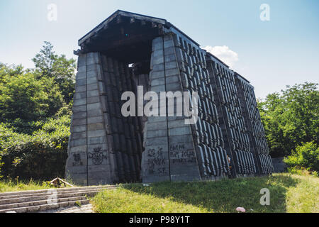 the dark concrete slabs of the Yugoslav-era Mausoleum of Struggle and Victory, Čačak, Serbia Stock Photo