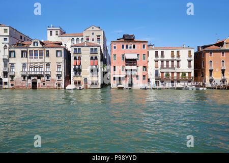 Venice houses facades and the grand canal in a sunny day in Italy Stock Photo