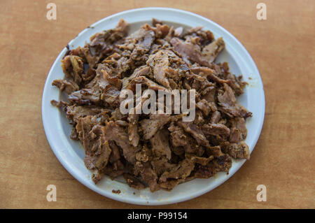 Shawarma plate on wooden table Stock Photo