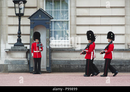 LONDON - AUGUST 8, 2015: Changing of the guard in Buckingham Palace. Stock Photo