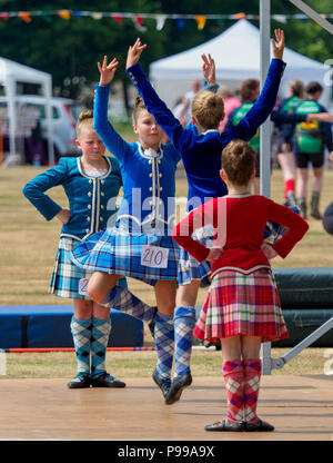 Stonehaven, Scotland - 15 July, 2018: Young competitors performing in the Highland Dance competition during the 2018 Highland Games Stock Photo