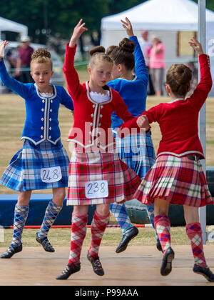 Stonehaven, Scotland - 15 July, 2018: Young competitors performing in the Highland Dance competition during the 2018 Highland Games Stock Photo