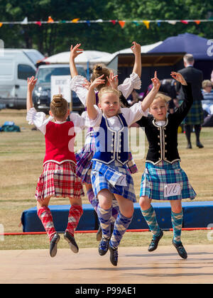 Stonehaven, Scotland - 15 July, 2018: Young competitors performing in the Highland Dance competition during the 2018 Highland Games Stock Photo