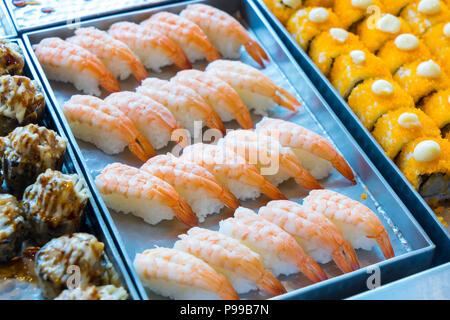 Delicious Shrimp Sushi in the roll on metal plate for buffet Stock Photo