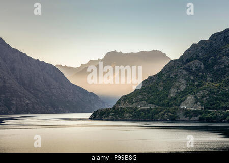 View looking north on the Kingston Arm of Lake Wakatipu, near Queenstown, New Zealand as sunset approaches. Stock Photo