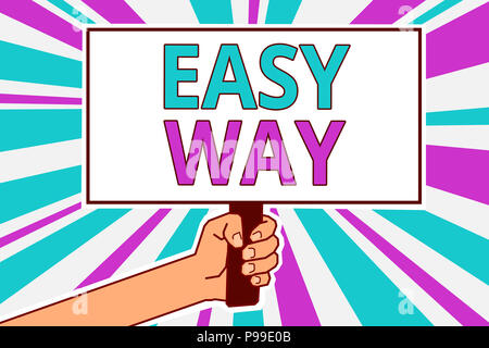 Conceptual hand writing showing Easy Way. Business photo showcasing making hard decision between two less and more effort method Man hold board idea r Stock Photo
