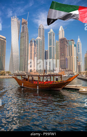 Dubai Marina with boats against skyscrapers in Dubai, United Arab Emirates Stock Photo