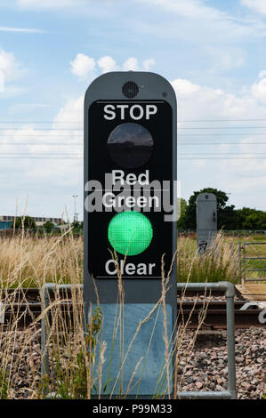 Warning light at pedestrian crossing over railway lines at Penleigh Park Crossing, Westbury, Wiltshire. UK Stock Photo