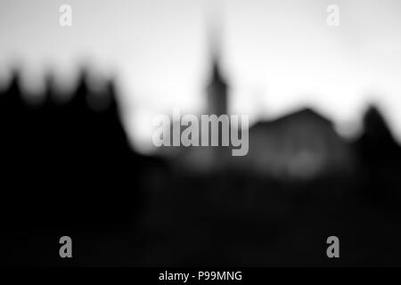 Silhouette of church, defocused long exposure image processed in black and white Stock Photo