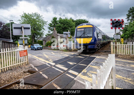 Train at Level Crossing Stock Photo