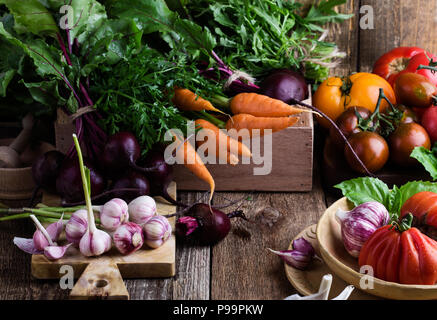 Fresh organic homegrown colofrul vegetables on wooden rustic table, harvest still life Stock Photo