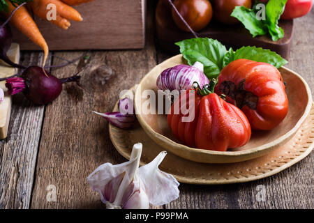 Fresh organic homegrown colofrul vegetables on wooden rustic table, harvest still life Stock Photo