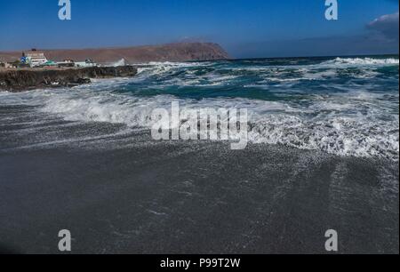 Beach of Arica Chile. Morro de Arica, Chile. Arica is a port city in northern Chile known for its ideal beaches for surfing. Stock Photo