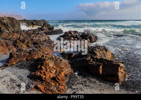 Beach of Arica Chile. Morro de Arica, Chile. Arica is a port city in northern Chile known for its ideal beaches for surfing. Stock Photo