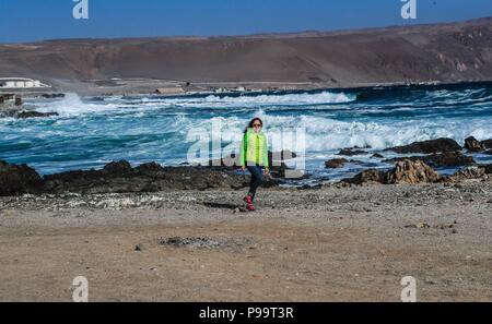 Beach of Arica Chile. Morro de Arica, Chile. Arica is a port city in northern Chile known for its ideal beaches for surfing. Stock Photo