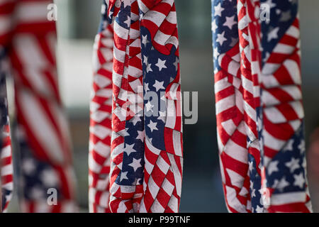 Prescott, Arizona, USA - June 30, 2018: American flag bandanas hanging on rack at 4th of July festival in downtown Prescott Stock Photo