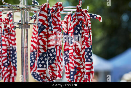 Prescott, Arizona, USA - June 30, 2018: American flag bandanas hanging on rack at 4th of July festival in downtown Prescott Stock Photo